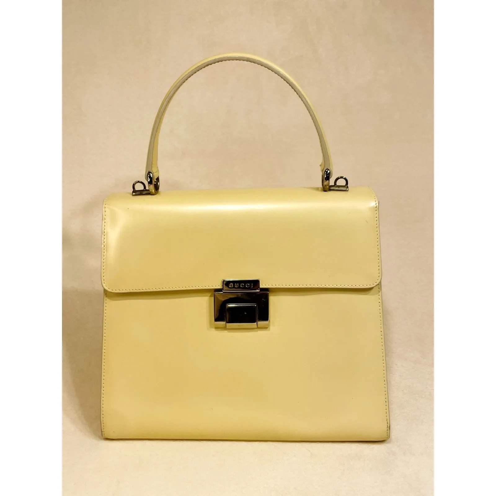 RARE, Gucci, pearly ivory/pale yellow smooth leather, Tom Ford era Padlock, two-way style with chrome hardware & removable strap
